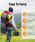 Person carrying Portable Solar Generator 300W Peak Power Station with 260Wh Battery and 40W Solar Panel for camping.