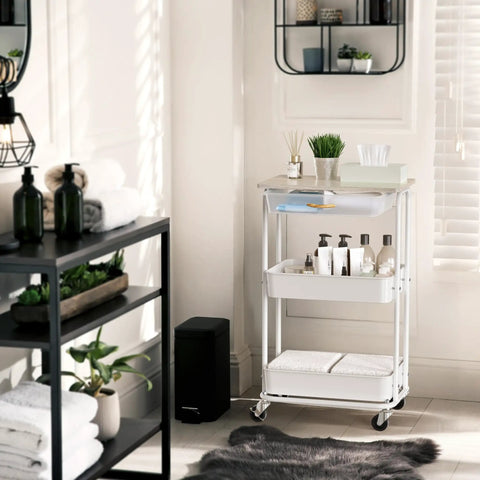 3 Tier Rolling Utility Cart With Drawer And Wood Tabletop Maple Finish Slick Mobile Side Table And Nightstand Slim Storage Trolley For Bedroom Bathroom Office And Art Supplies Easy Roll Casters in a bathroom setting