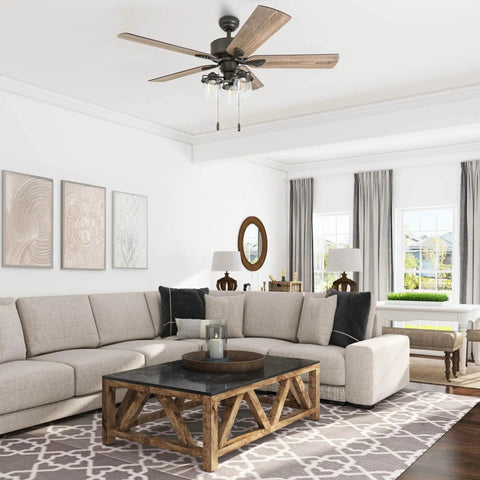Living room with River Run 52 Inch Farmhouse LED Ceiling Fan With Light, Bronze Finish, Rustic Barn Wood Blades, Edison Style Lighting.