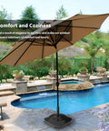 Beefed Up Patio Umbrella Base With Wheels Fillable To 100 Lb Windproof Mobile Square Market Stand by poolside.