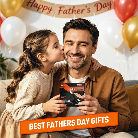 Father holding LED flashlight gloves gift, daughter kissing his cheek, balloons and 'Happy Father's Day' banner in background