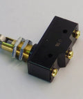 Robust Industrial Limit Switch Featuring Panel Mount Cross Roller Plunger And 15 Amp 480 Volt Spdt Contacts Built Badass Tough For Rock Solid Automation Work And Easy Install, showing side view.