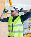 Worker wearing MX300 Safety Glasses With Anti Fog Lenses ANSI Z87 Plus 100 Percent UV Protection CBR65 in construction site
