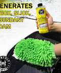 Complete All In One Car Wash And Detailing Kit with citrus car wash soap and green microfiber mitt creating foam