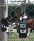 Heavy Duty Magnetic Fence Mount For Action Cameras And Phones With Dual Quarter Inch Mount Points Built For Game Day Recording On Baseball And Tennis Fields Quick Setup For Mevo Start GoPro iPhone And Other Cameras installed on a chain-link fence with attached radar gun.