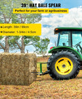 Beefed Up 39 Inch Hay Bale Spear With 3600 Pound Capacity Quick Attach Square Bale Spear on tractor moving hay bale