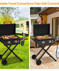 Portable grill with open lid on wheels, cooking food outdoors, showing propane tank connection for patio and camping use.