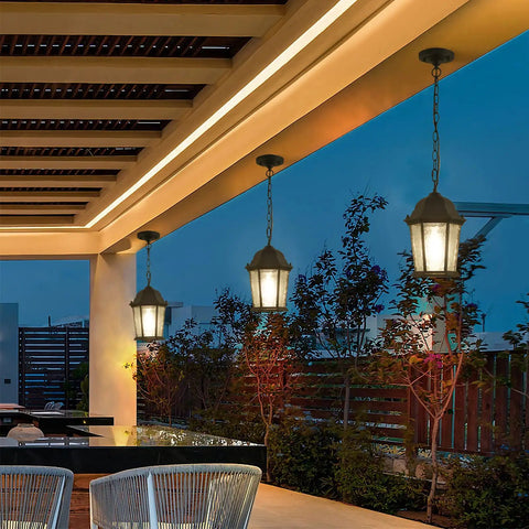 Patio with 7.5 Inch Outdoor Pendant Light For Porch Modern Black Die-Cast Aluminum Fixture With Ripple Glass under a pergola