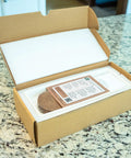 Open box revealing No Fuss Microgreens Growing Kit For Windowsill Gardens With Two Ceramic Trays Coconut Coir And Premium Seeds