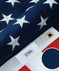 Close-up of Rugged Outdoor American Flag 3x5 Foot Made In USA From 100 Percent Polyester with sewn stripes and embroidered stars.