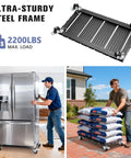 KEDSUM 2200 Lbs Heavy Duty Furniture Dolly with thick steel frame, transporting a refrigerator and moving bags outside.