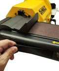 Heavy Duty 4 By 36 Belt And 8 Inch Disc Sander With 7 Amp Motor; close-up of a hand adjusting the tension lever.