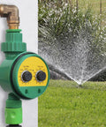 Automatic Sprinkler Timer With Rain Delay And Manual Watering next to sprinkling water on grass.