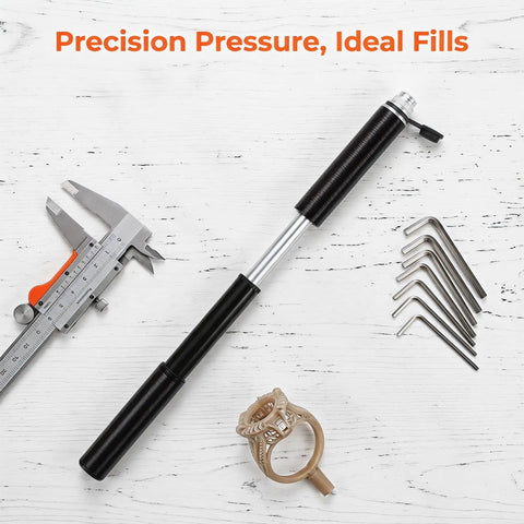Manual Hand Wax Injector Pump With Leak Free Air Supply And Universal Connector on workbench with tools and wax model
