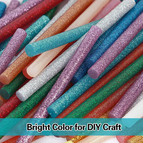 Colorful assortment of 280 Piece Glitter Mini Hot Glue Sticks Set in 14 colors for DIY craft projects.