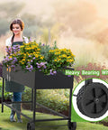 Elevated Garden Bed With Legs And Storage Shelf, Mobile Planter Box For Outdoor Plants, Heavy Duty Metal Raised Garden Bed For Backyard Or Balcony, Anti Rust Coating, Black, 51 By 26 By 31.5 Inches with flowers and wheels