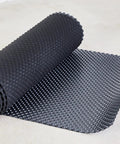 Premium Underlayment Roll With Heavy Duty Moisture Barrier For Engineered Hardwood Laminate And Vinyl Plank Floors Supporting 5MM Or Thicker Click Lock Systems No Sweat Setup Delivers Top Shelf Durability, black roll with texture on concrete.