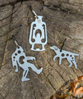 Ultra Compact Stainless Steel Long Multi Tool With Carabiner Clip Four Position Hex Wrenches on tree stump