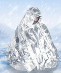 Person covered with Mylar Emergency Blankets Space Blanket Thermal Survival Gear For Camping And Outdoors in snowstorm.
