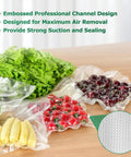 Vacuum Sealer Bags Rolls 2 Pack 11 Inch By 20 Foot Heavy Duty Storage Bags with vegetables sealed inside on a wooden table.