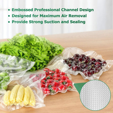 Vacuum Sealer Bags Rolls 2 Pack 11 Inch By 20 Foot Heavy Duty Storage Bags with vegetables sealed inside on a wooden table.
