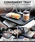 Steering Wheel Desk For Laptop And Eating Two In One Car Tray With Cup Holder Pen Slot; multipurpose travel accessory in use.