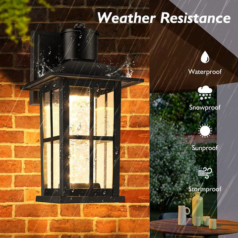 Crystal Bubble Glass Outdoor Wall Lanterns 2 Pack on brick wall, lit in rain showing weather resistance, modern sconce design