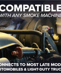 Front view of EVAP leak-detection kit connector and hose installed in car engine bay