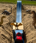 Classic 15-Foot Race Track Starter Set With 2-Lane Wide Track, 2026 Upgrade, red car on blue track, dinosaur toys on sand