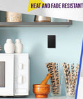 No Sweat Install Hella Sleek Matte Decorator Wall Outlet 15 Amp Electrical Receptacle Compact One Gang Wall Socket With Smudge Proof Coating For Homes installed above a microwave in a kitchen.