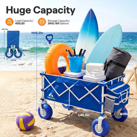 All Terrain Beach Wagon With Big 9 Inch Balloon Wheels For Sand And Grass 400 Lb Heavy Duty Collapsible Cart loaded with beach gear on sand
