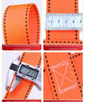 Heavy Duty Hoisting Net For Secure Equipment Transport And Construction Projects 100x100 Cm Mesh Grid 10 Cm 300 Kg Capacity Built For The Jobsite Pro Grade Industrial Strength Lifting Net orange webbing close-up with ruler and caliper