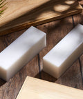 Two UHMW solid plastic blocks in white polyethylene, 7.9 x 2.4 x 2.4 inches, used as heavy duty tapping blocks for wood flooring