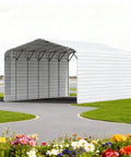 Heavy Duty Metal Garage And 20 X 30 Foot Steel Carport Featuring A Built Like A Tank 14 Gauge Galvanized Frame And 26 Gauge Panels with open front view.