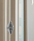 Drop Leaf Folding Table Hinge Set For Dining Tables, sturdy iron build, silver hinge shown installed on light-colored wood frame.