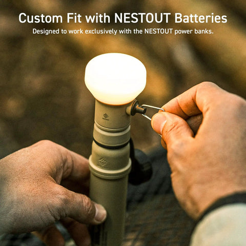 Go-To Rugged Outdoor Camping LED Lantern With Mini Tripod Dimmable USB Powered Soft Light IP44 Weatherproof in beige held outdoors
