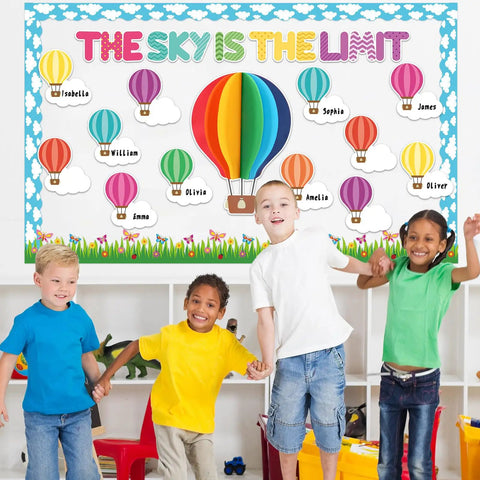 Children in front of 3D Hot Air Balloon Bulletin Board Set With Totally Colorful Name Tags For Back To School Classroom Decor Motivational The Sky Is The Limit Cutouts Cloud Borders And DIY Wall Art Kit