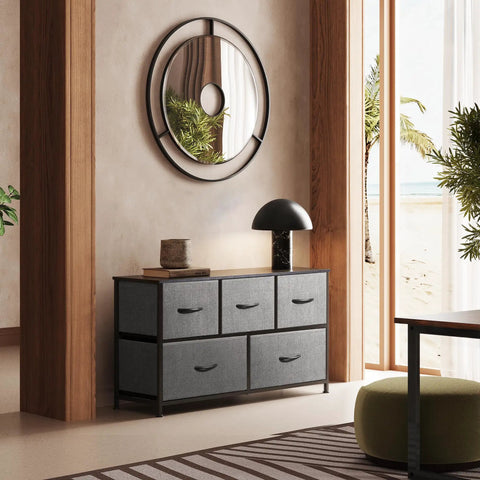Five Drawer Fabric Dresser For Bedroom And Closet Storage, dark grey wide chest with fabric bins in stylish living room setting.