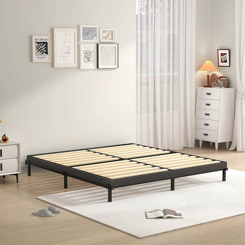 Heavy Duty 2 Inch Queen Box Spring With Rounded Corners And Ironclad Steel Base featuring premium wood slats in a modern bedroom setup.