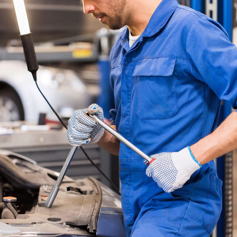 Mechanic using Metric Deep Socket Set One Half Inch Drive 18 Piece 6 Point Chrome Sockets 10mm To 27mm under car hood