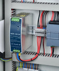 Beefed-Up Industrial 12V DC DIN Rail Power Supply 120W 10A, 100-240VAC Input, Ultra Slim Switching Converter With Low Ripple And Noise For Automation Controllers, High Efficiency, Rugged Industrial Grade installed in metal control cabinet