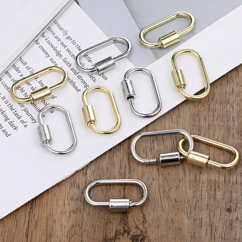 Ten Pack Screw Carabiner Lock Charms For DIY Jewelry Making Gold Tone Small Locking Carabiners Necklace Clasp Hooks And Key Ring Quick Links 17 By 29 Mm Durable Jewelry Findings For Crafting displayed on wood and paper surface