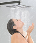 Woman enjoying Brushed Finish Shower System With Multi Function Faucet, Rain Head And Handheld Sprayer, High Flow Water Pressure