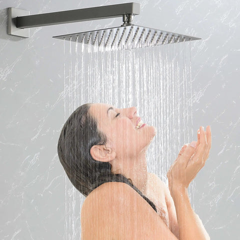 Woman enjoying Brushed Finish Shower System With Multi Function Faucet, Rain Head And Handheld Sprayer, High Flow Water Pressure