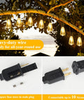150Ft Outdoor Edison String Lights With 77 Dimmable ST38 LEDs, shatterproof bulbs hanging on a tree branch at sunset.