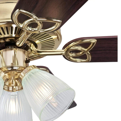 Close-up of 52 Inch LED Indoor Ceiling Fan With Light Kit, Polished Brass Finish, Reversible Walnut And Oak Blades, Clear Ribbed Glass Light