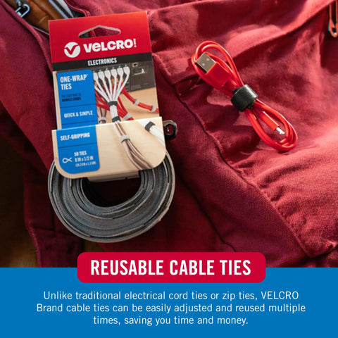 Velcro brand one-wrap ties for electronics in packaging, red cable tie beside, showcasing reusable cable ties for tidy cords.