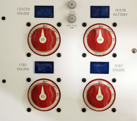 Blue Sea Systems 6006 m-Series four red battery isolator switches on a white control panel