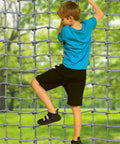 Child climbing on Playground Climbing Net And Cargo Rope Kit For Outdoor Fun Nylon Rope Ladder Swing Balcony Banister Guard Mesh.