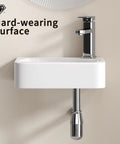 HAOCHRYSYPH Wall-Mounted Bathroom Sink, Ceramic, Milk White, 14x10 in. close-up of the hard-wearing surface and faucet.
